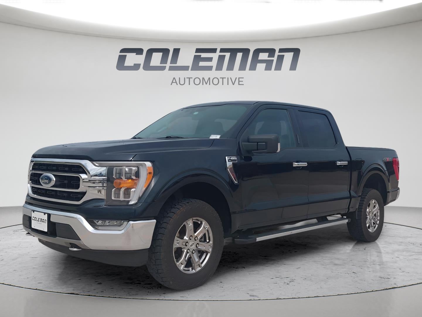 2021 Ford F-150 XLT in Antimatter Blue — front three-quarter view