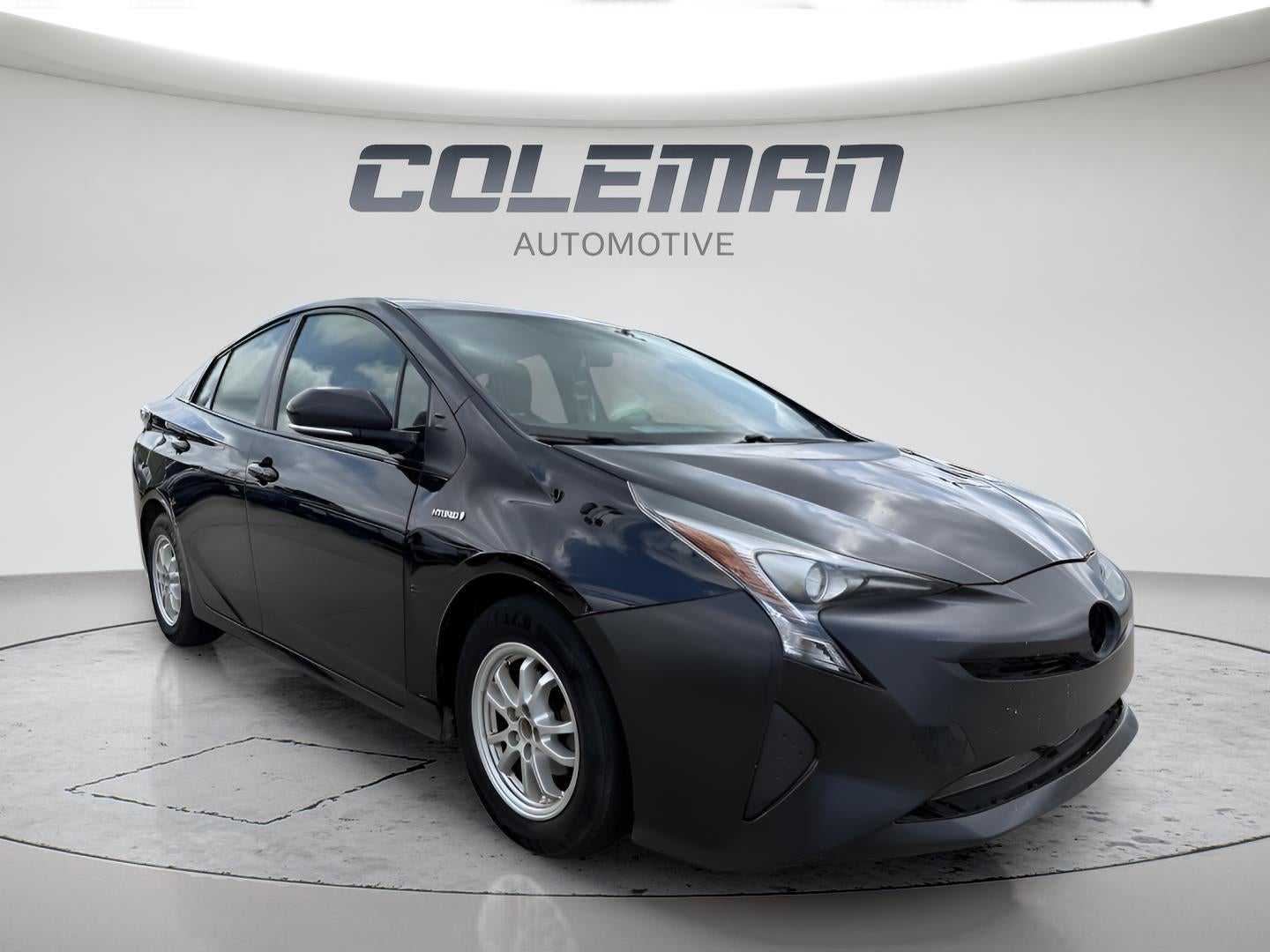 2016 Toyota Prius — rear three-quarter view